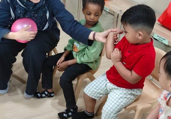 Gross Motor Activity: Passing Balloon with Elbow 🎈